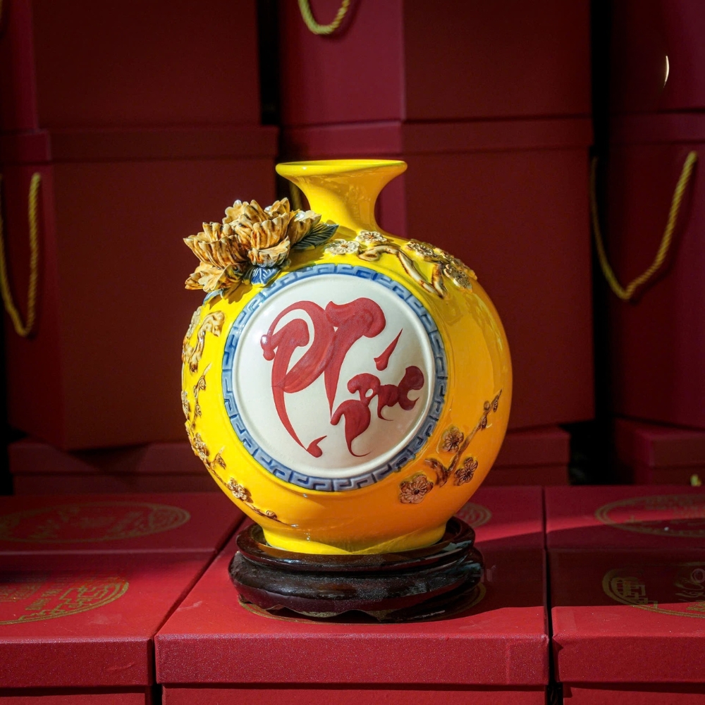 binh hut loc chu phuc vang